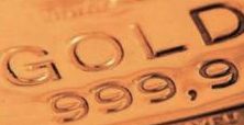 Nahaufnahme eines Goldbarrens mit der Prägung "GOLD 999,9".